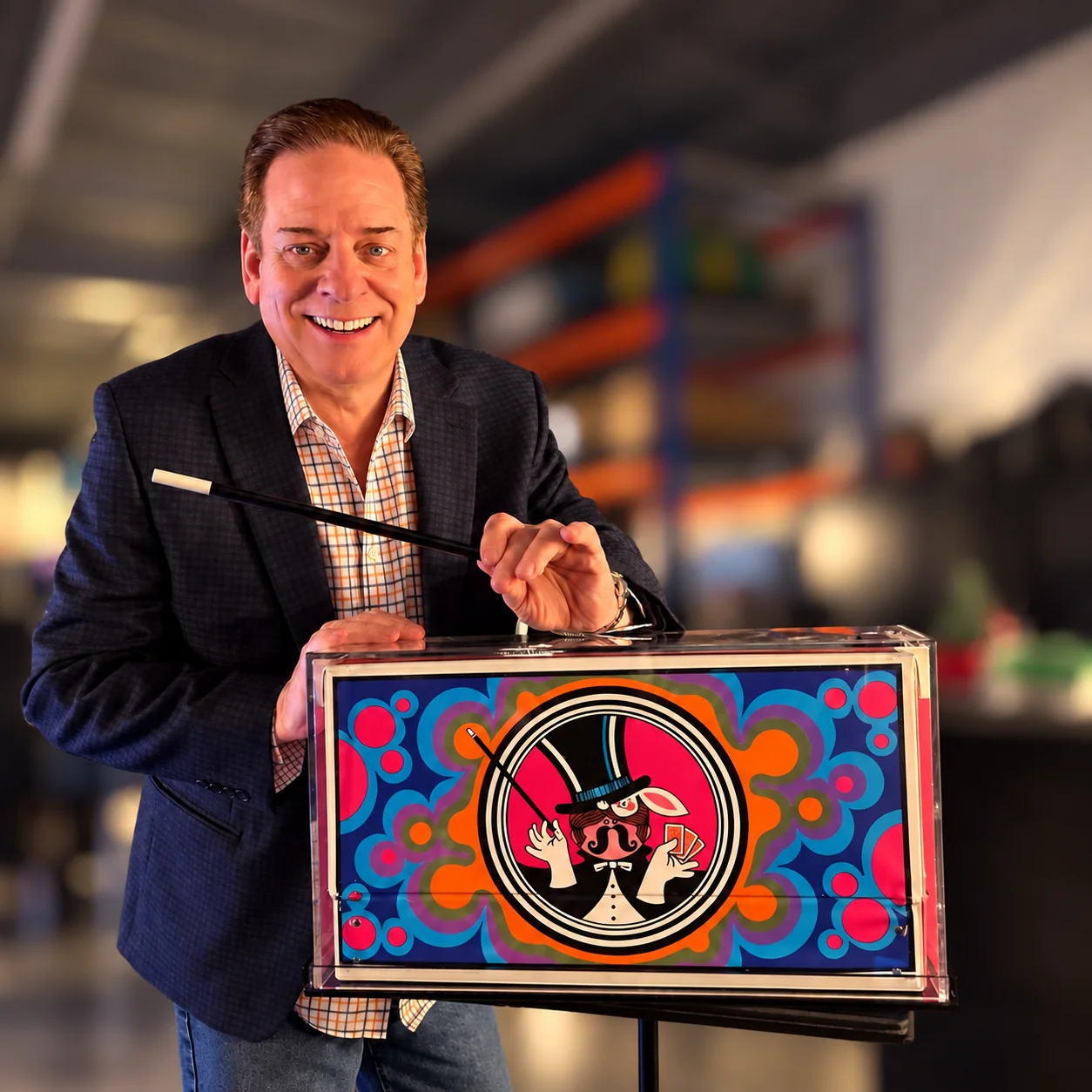 Mike Thornton with his magic wand and colorful magic case