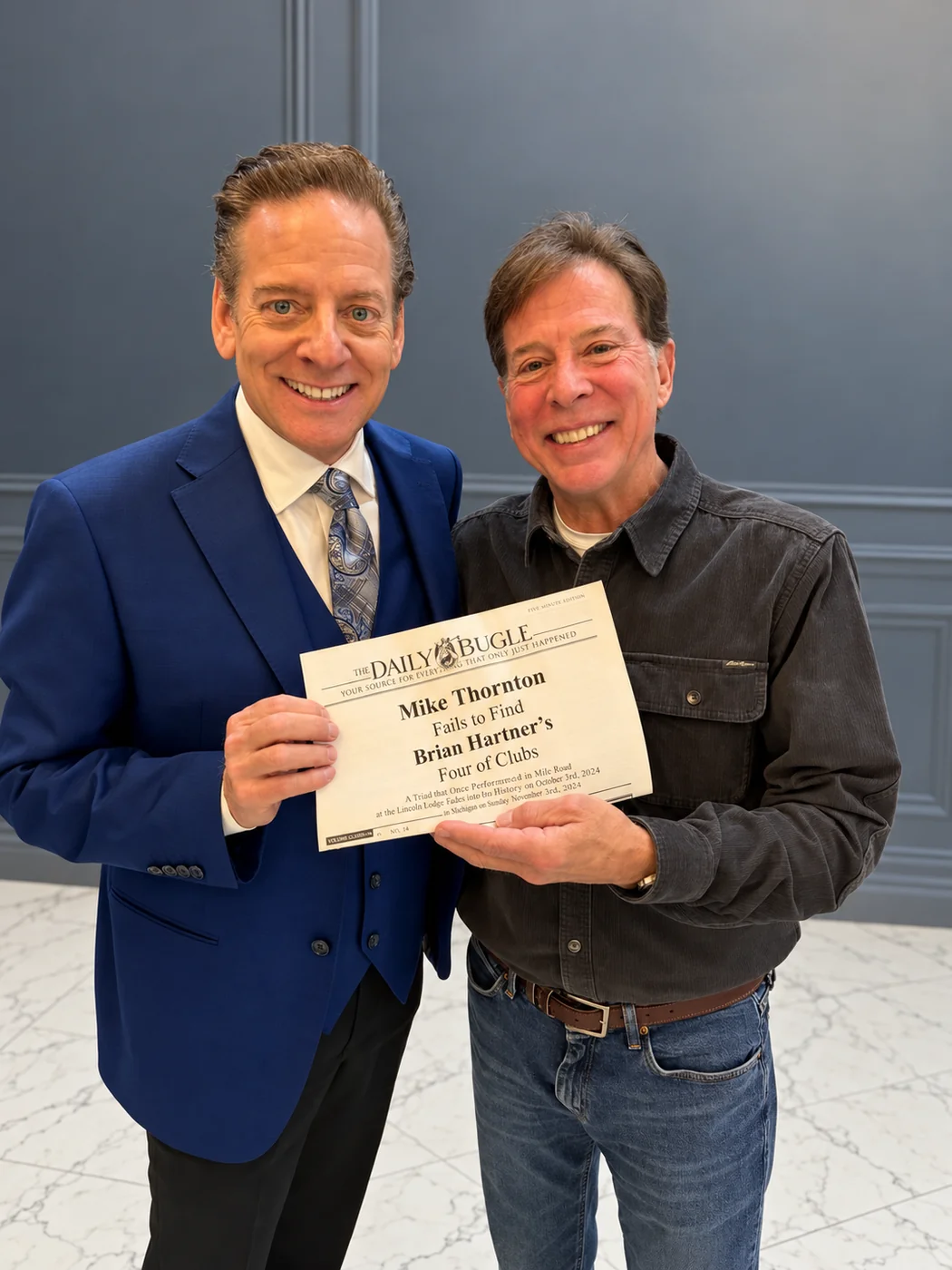 Mike Thornton and a smiling guest holding a personalized Daily Bugle newspaper from a custom card trick